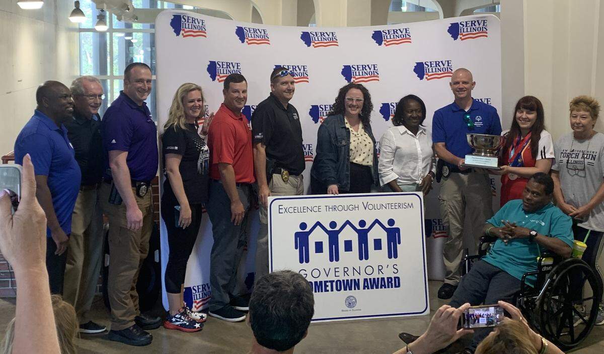 For the city-wide efforts supporting the Special Olympics, O’Fallon was among four Governor’s Hometown Awards finalists. O’Fallon ultimately brought home the Governor’s Cup after winning over the Governor’s Hometown Awards judges with their presentation. The traveling trophy was awarded at the Illinois State Fair in Springfield on Thursday, Aug. 18. The group accepting the award included police officers, city officials and Special Olympic athletes.