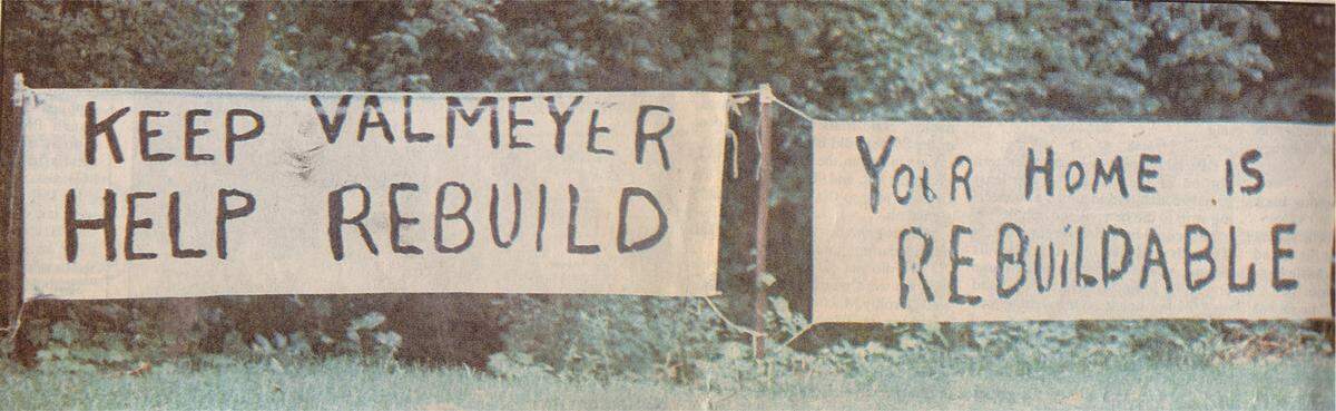 Signs encouraging Valmeyer residents to rebuild after the flood of 1993.