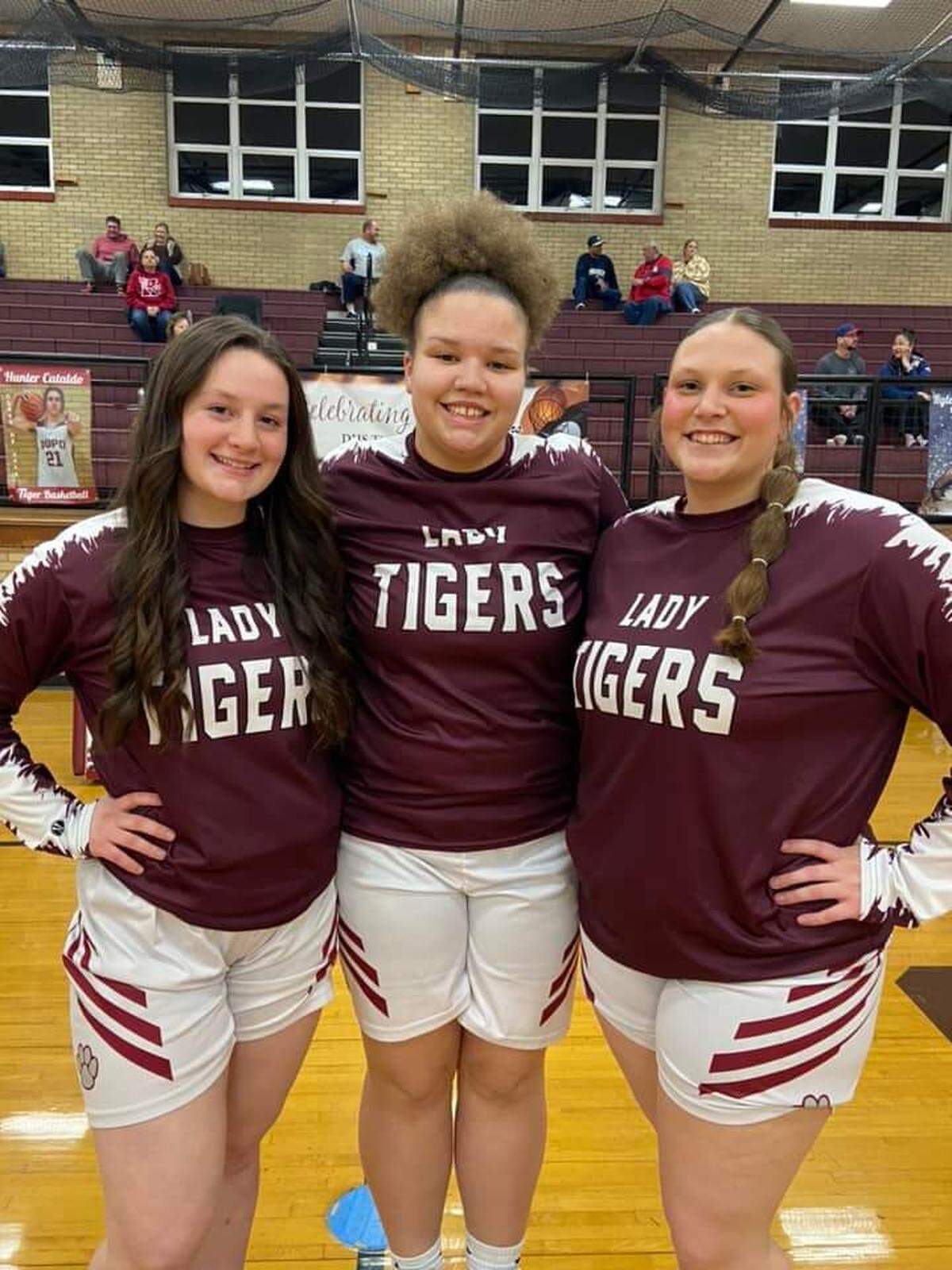 T’Yonna Burris of Dupo High School, center, is the winner of this week’s Belleville News-Democrat Girls Player of the Week high school basketball poll, as selected by readers of bnd.com. She is pictured here with teammates Kyann Prater, left, and Steffany Stansch, right.