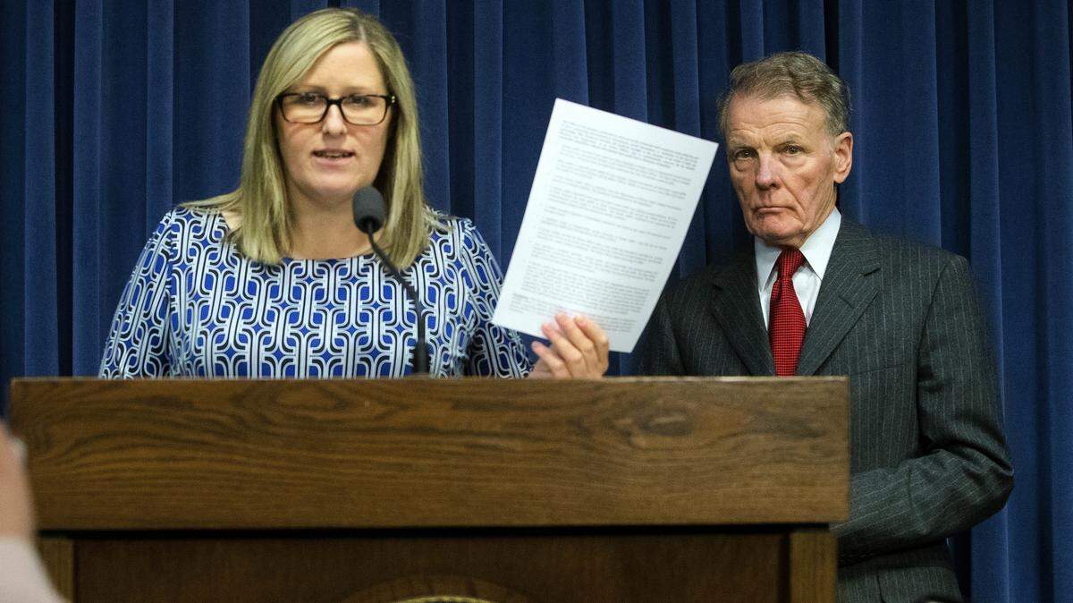 Illinois House Speaker Michael Madigan listens as attorney Heather Wier Vaught  discusses a list of sexual harassment complaints in Speaker Madigan's office in the past five years.
