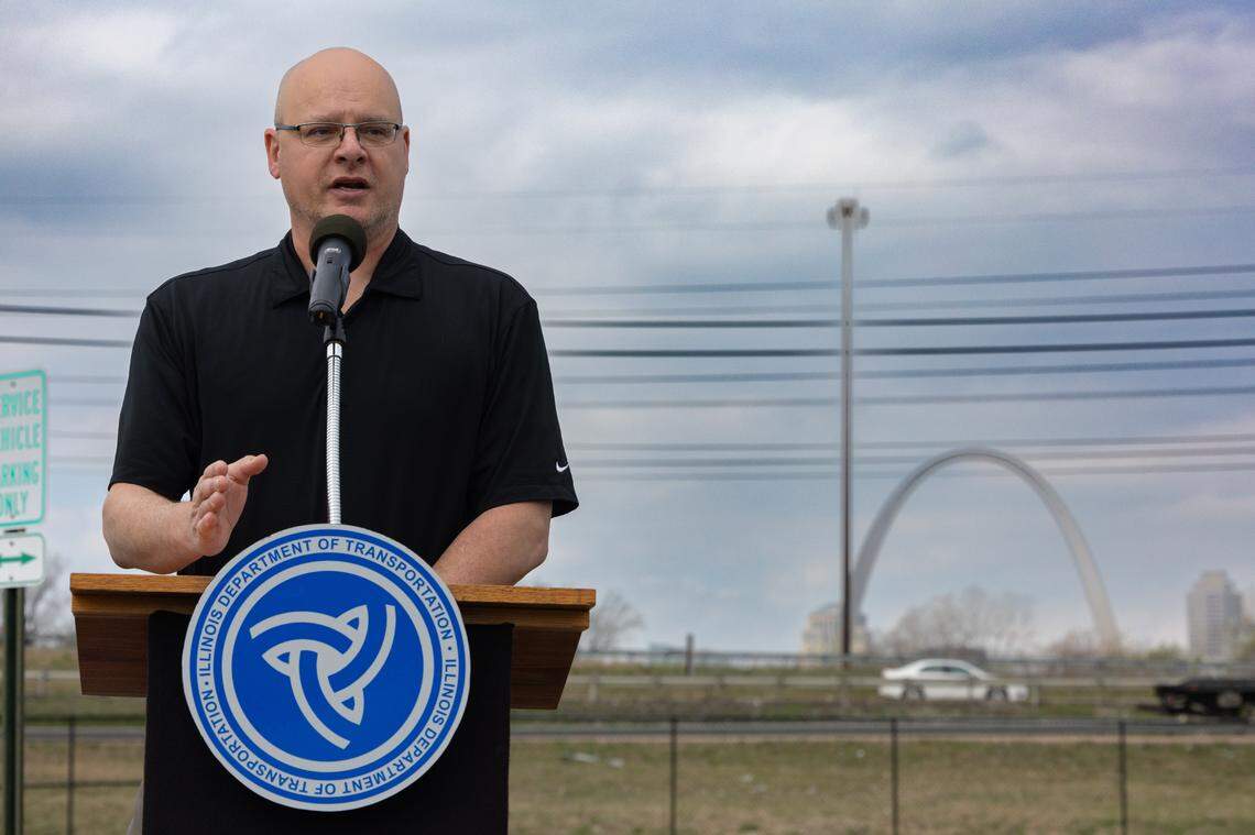 Joel Cumby, the project implementation engineer for IDOT, holds a news conference in East St. Louis, Ill. with the St. Louis Arch in the background, to discuss the impending work on the Poplar St. Bridge on March 13, 2024.