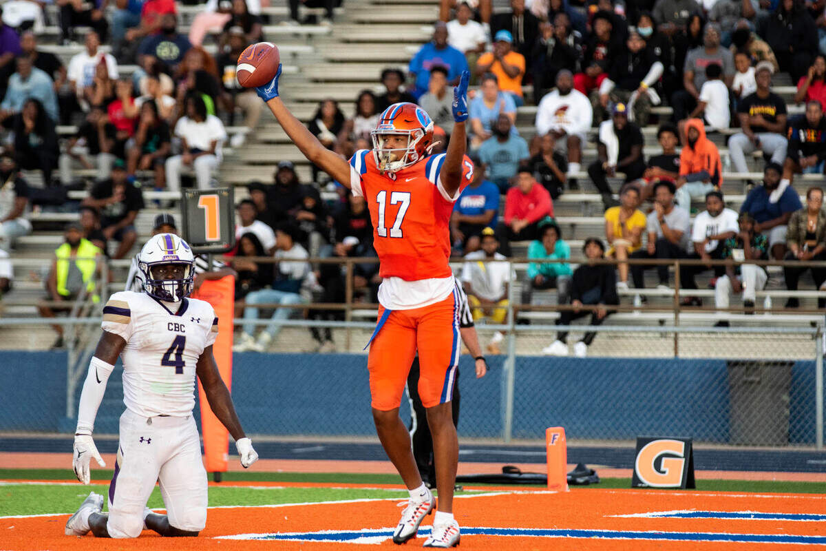 September 3, 2022 - East St. Louis, IL - FlyerÕs Dejerrian Miller celebrates after scoring a touchdown during the annual Gateway Scholars Football Classic football game between CBC and East St. Louis. East St. Louis went on to a 64 to 19 win. [Photo: Chris Johns]