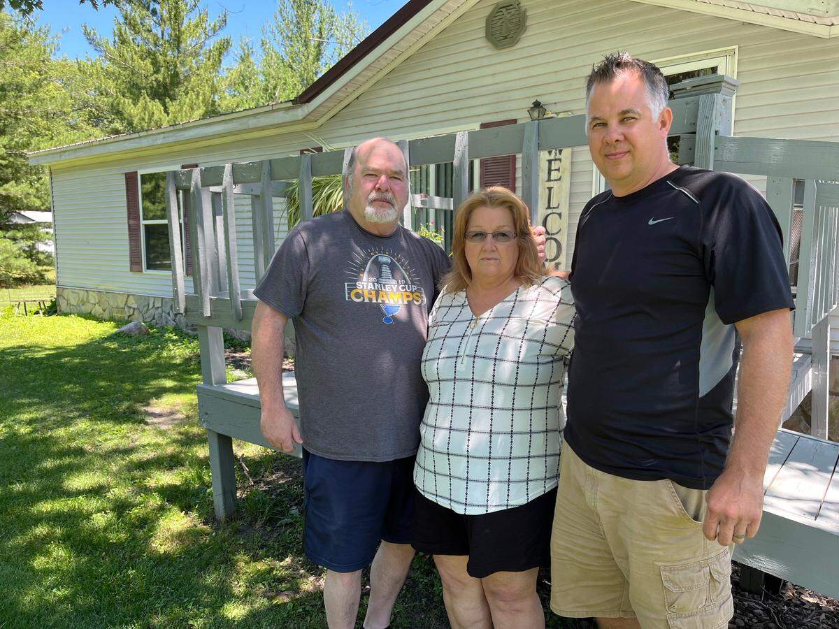 Brittany Moeser’s family includes, left to right, stepfather and mother Ron and Debra Wilkerson and half-brother Justin Maynard, shown at the Wilkerson home in Clarmin, near Marissa.