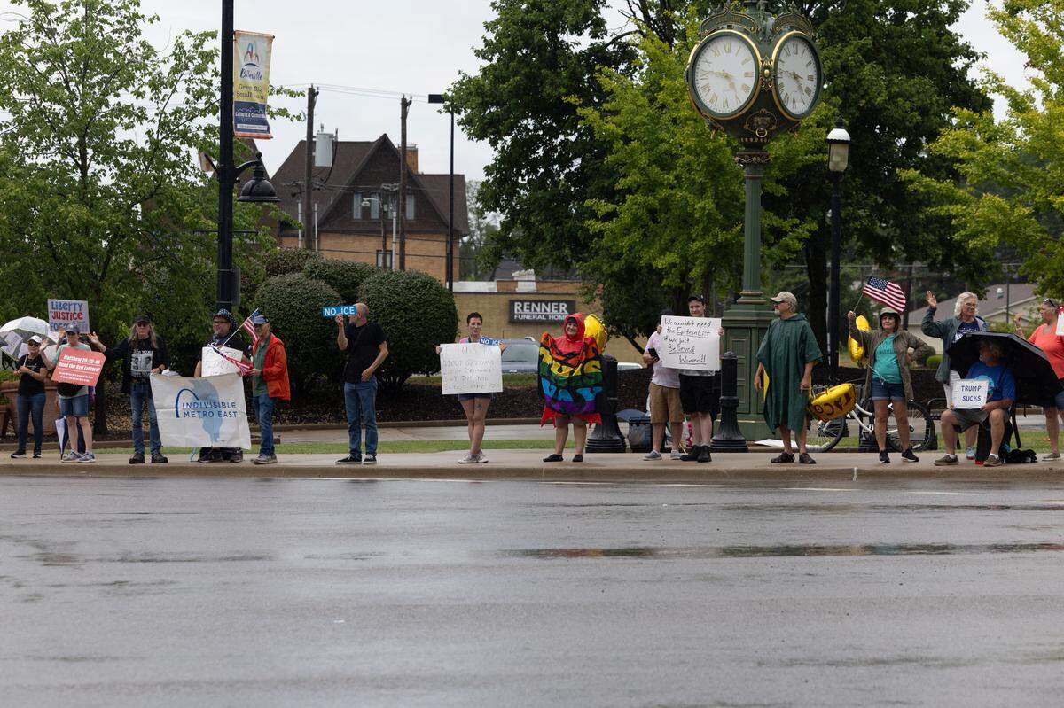 Protestors line up for a protest at Belleville’s Public Square.