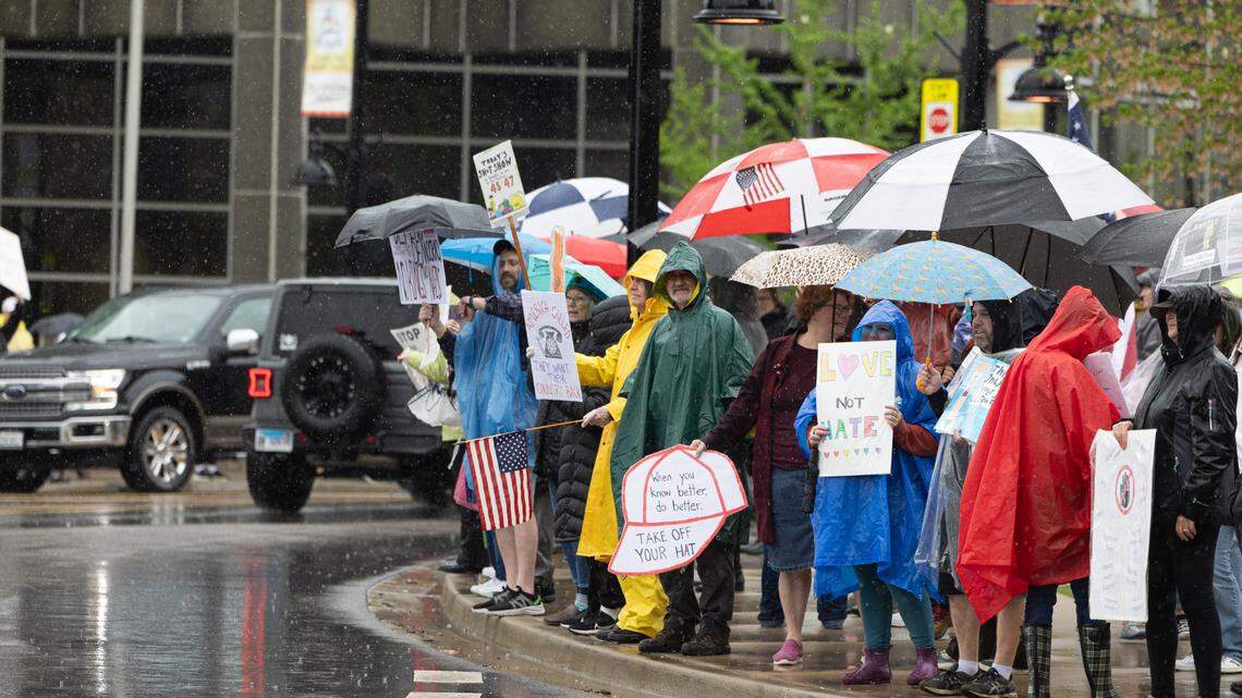 Hundreds join rainy Belleville public square protest against Trump