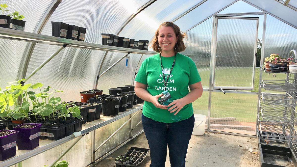 Amanda Mellenthin and her campus greenhouse.