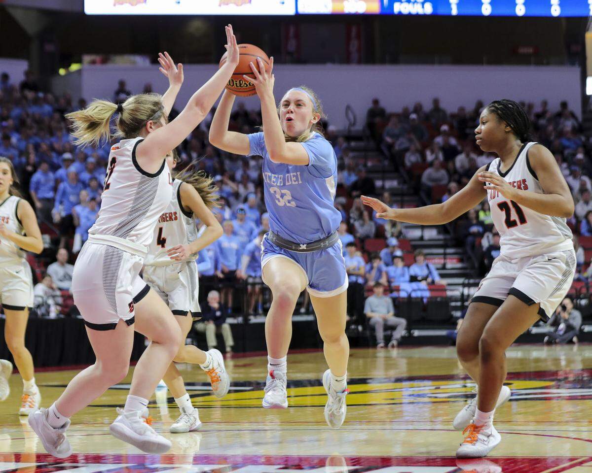 Mater Dei’s Amelia Beer drives to the basket during Saturday’s IHSA Class 2A state championship game at CEFCU Arena (formerly Redbird Arena) on the campus of Illinois State University. Mater Dei ultimately prevailed 62-46 to claim the state title.