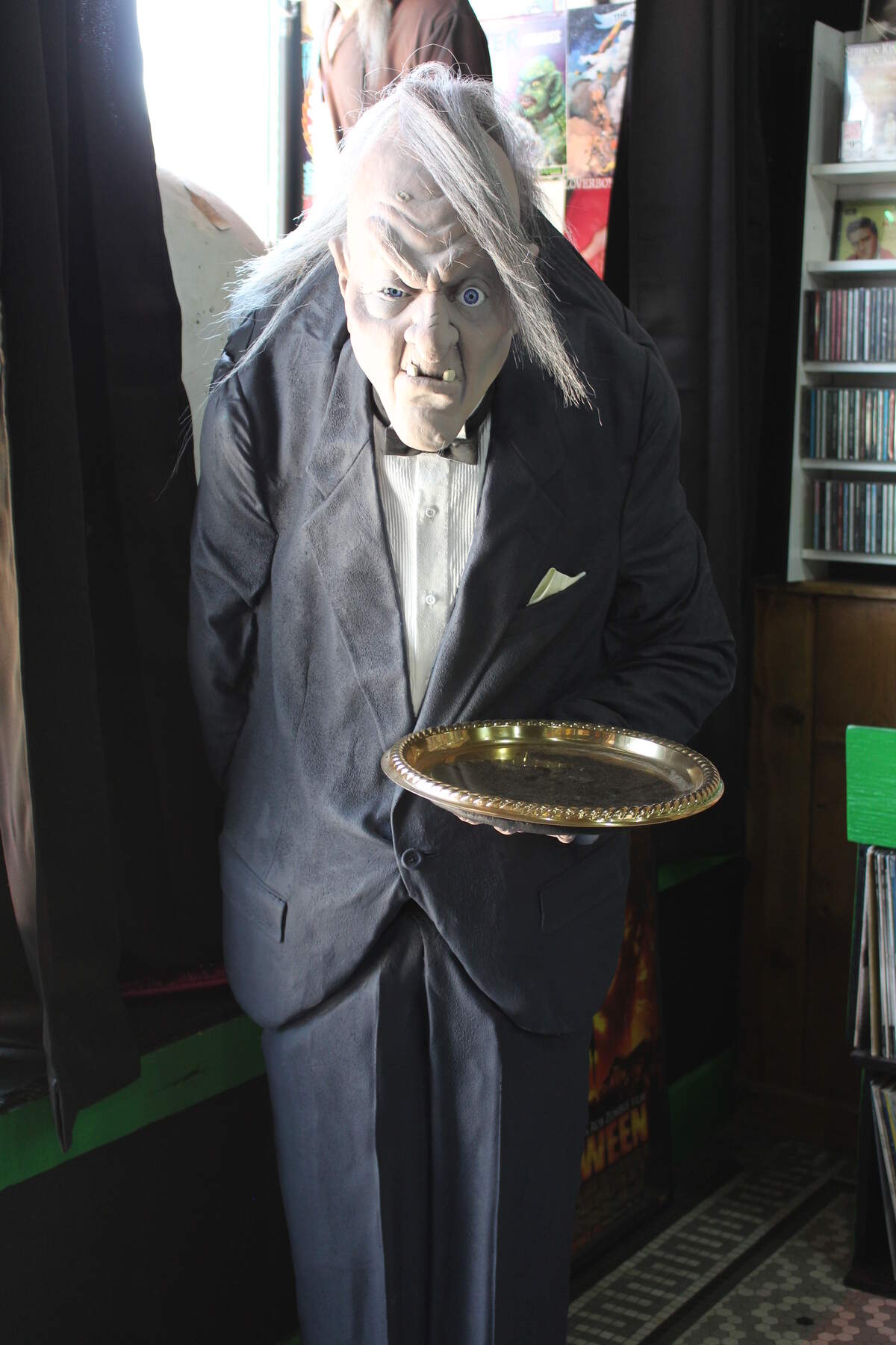 This creepy butler welcomes customers at the door of Monster Vinyl in Collinsville.