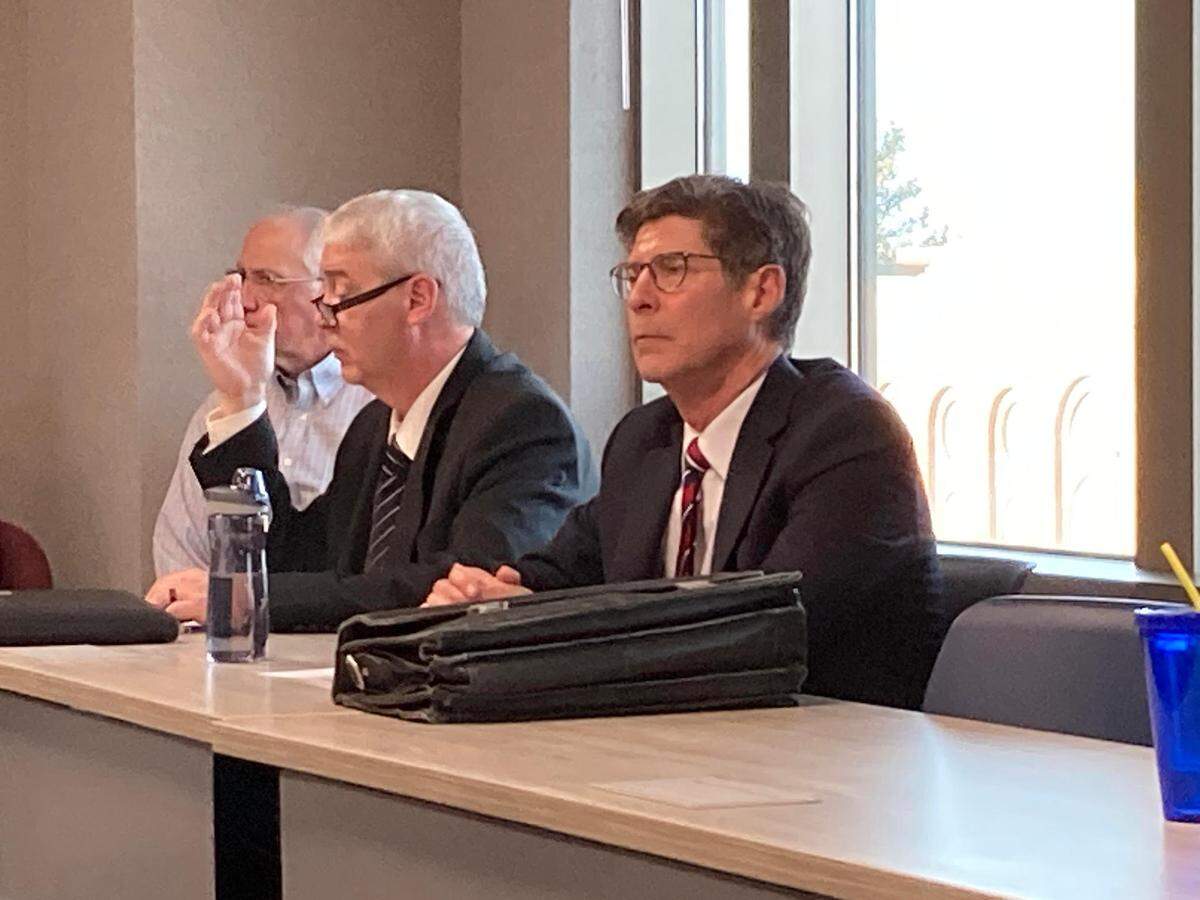 Madison County Board Chairman Kurt Prenzler listens as other members discuss a formal censure for handing a business card for his campaign to a vendor wanting to do business with the county. Prenzler, who is being challenged in the upcoming primary election by another Republican, Chris Slusser, said it was a simple mistake and that the censure vote was politically driven.