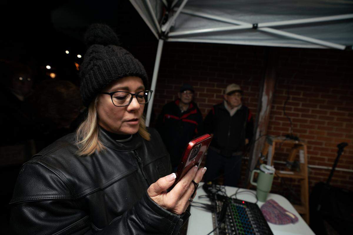 Lisa Meehan, a realtor and Waterloo resident, livestreams the Waterloo Queen of Hearts tournament on Jan. 30, 2024. Meehan has been going to every drawing for months after Sts. Peter and Paul Catholic School asked her to live stream the weekly drawings.