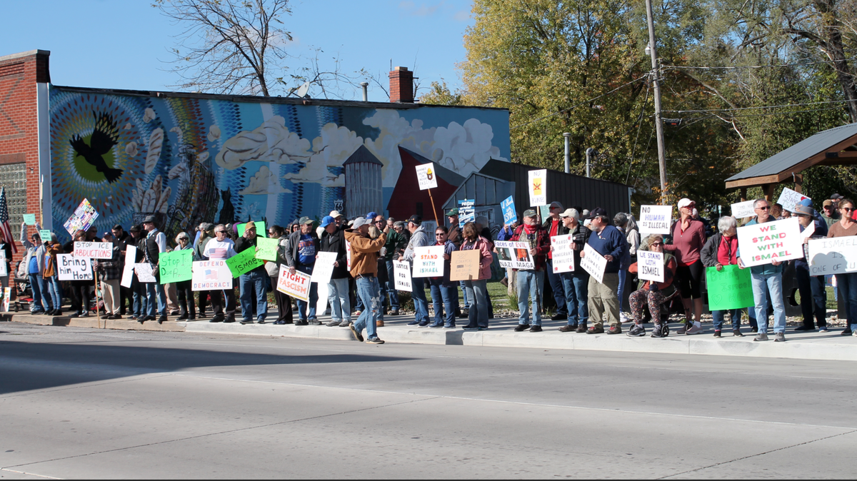 Hundreds of people attended a rally Sunday in Staunton in support of local father and Caldera Bar and Grill owner Ismael Ayuzo Sandoval, who was taken into custody by U.S. Immigration and Customs Enforcement on Oct. 29. Among their signs were “We stand with Ismael.”