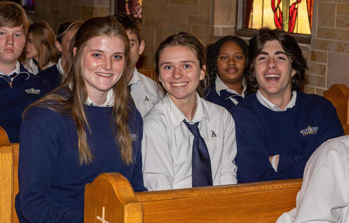 The Illinois High School Association has selected Althoff Catholic High School sophomore Gabby Orlet as its nominee for the 2022-23 National Federation of State High School Associations Sprit of Sport Award. Orlet, left, is pictured here with two of her Althoff classmates.