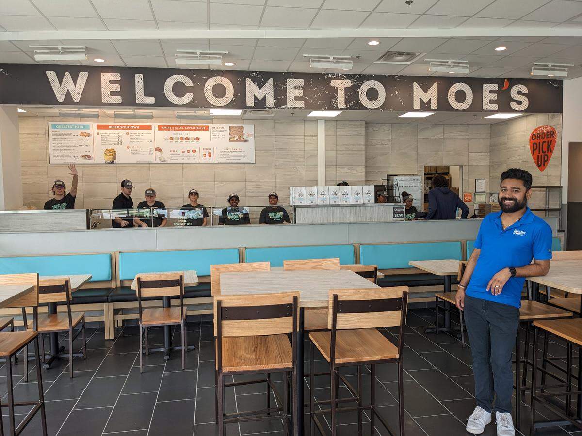 Moe’s Southwest Grill owner Steve Patel (right) and the Moe’s team are ready to serve customers at the soft opening. Moe’s opens Friday, Sept. 22, in Edwardsville.