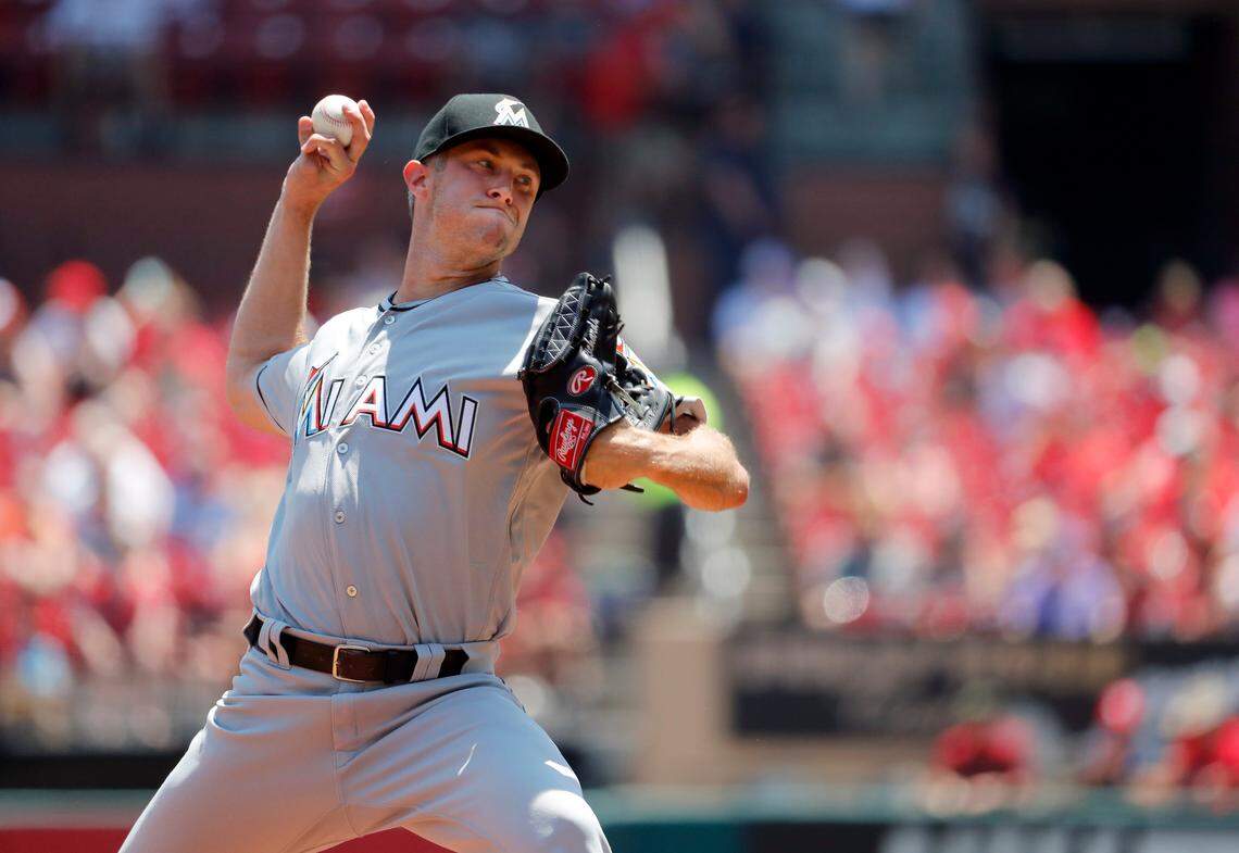Miami Marlins starting pitcher Trevor Richards throws during the first inning of a baseball game against the St. Louis Cardinals on Thursday, June 7, 2018, in St. Louis. Richards, an Aviston native, graduated from Mater Dei Catholic High School in Breese and spent time with the independent Gateway Grizzlies before signing a minor-league contract with the Marlins in July 2016.