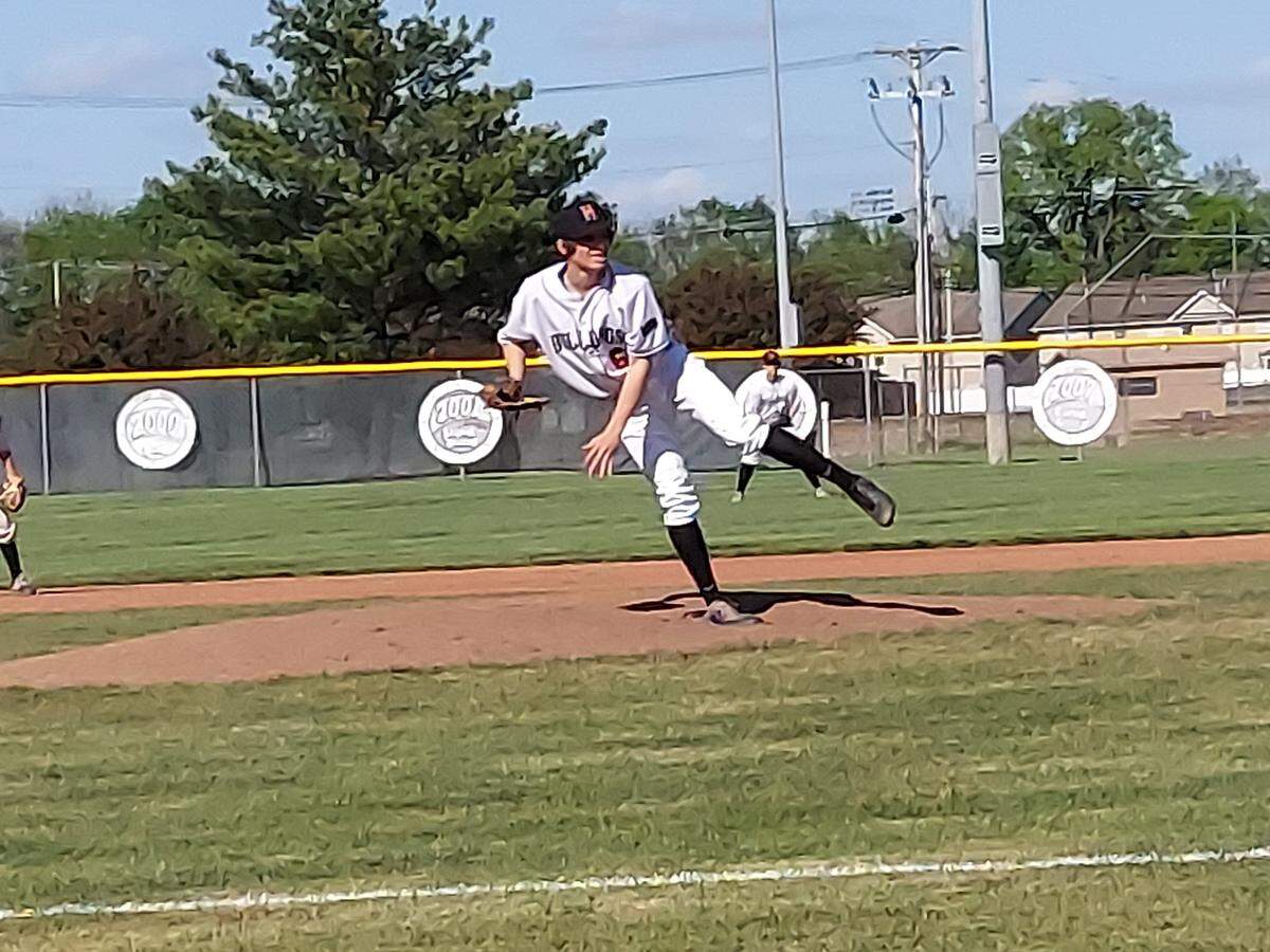 Highland lefthander Caleb Fohne finishes a delivery to home plate during a game against Jerseyville last season in which he fired 5 2/3 shutout innings in a 3-0 victory. Fohne is one of several key returnees for the Bulldogs this spring.