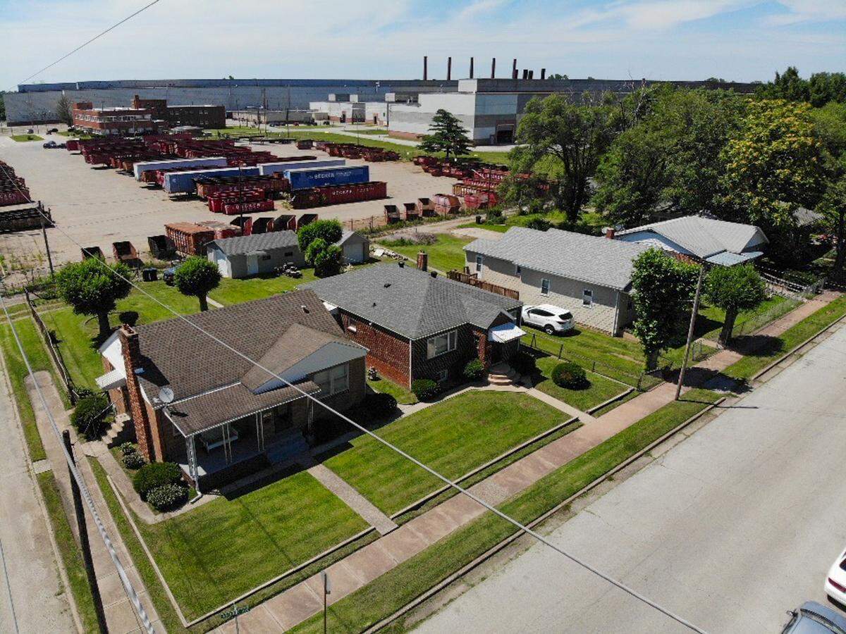 The Ratliff family home sits second from the left on June 10, 2024, next to the facility along the Venice-Madison border where radioactive elements were processed.