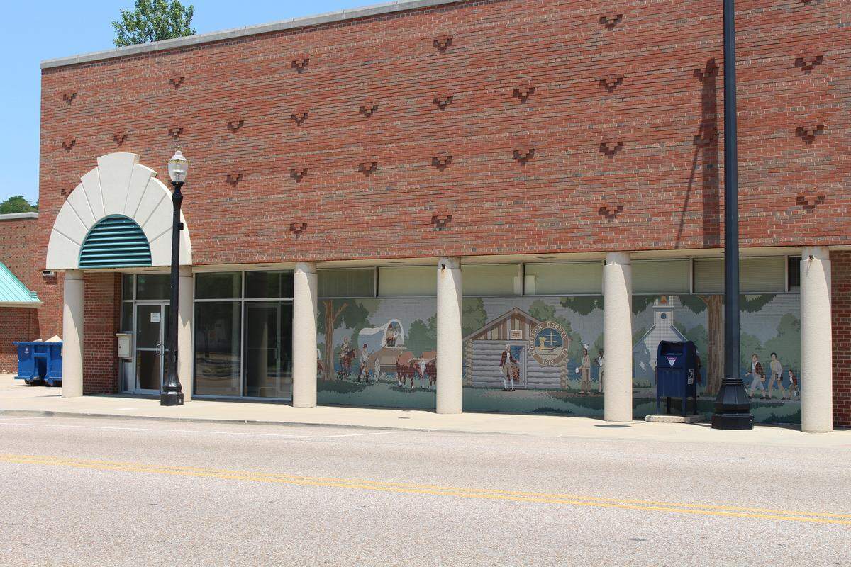 The mural created by architect Edward A. Kane on the old Edwardsville City Hall measures about 36 feet wide and 7 feet tall with 40,000 small ceramic tiles.