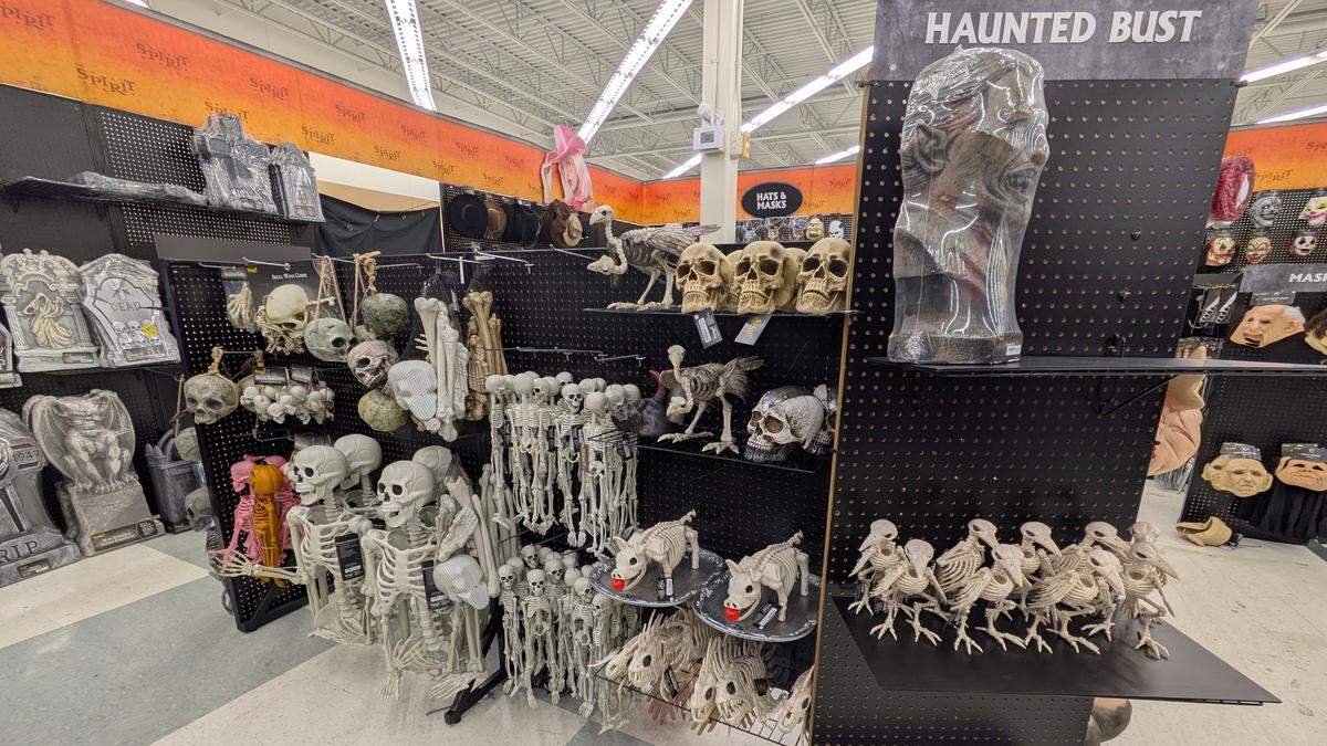 Graveyard and skeleton decorations are among the many themed items available at Spirit Halloween stores in the area.