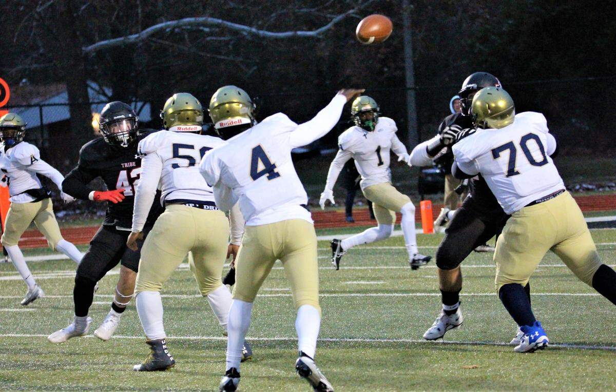 Althoff quarterback Braylon Grayson passes to Charleston Coldon against Johnston City during the Class 2A football quarterfinals this past season. Coldon took part in the Under Armour Camp on April 16 in Kansas City where he was one of two athletes to earn Defensive Back MVP honors.