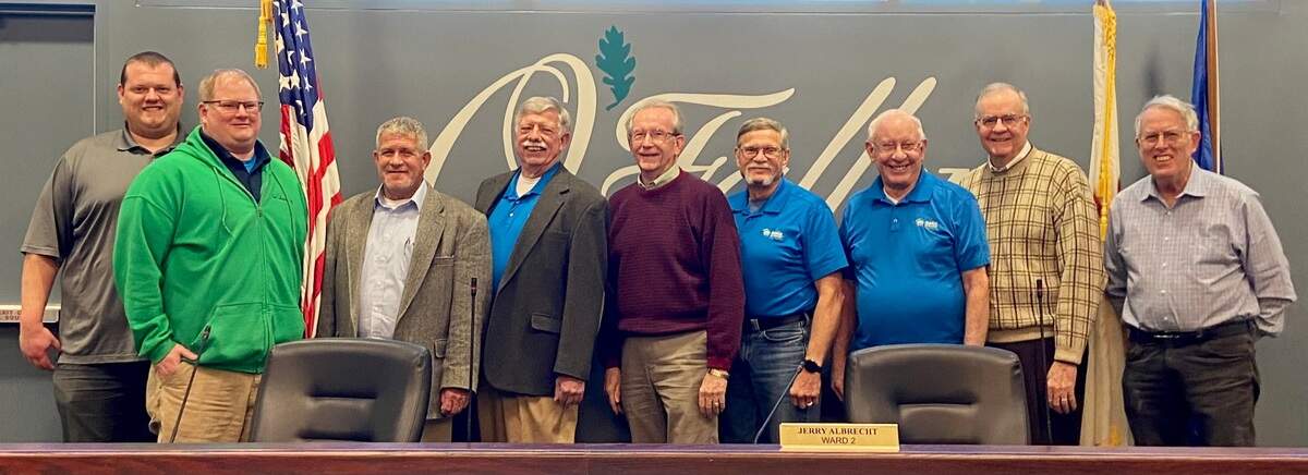 From left, David Frazier, operations manager C.A. Jones; Mike Needles, vice president, C.A. Jones; Ralph Jackson, executive director, Lewis and Clark Habitat for Humanity affiliate; Jim Campbell, O’Fallon chapter of Habitat for Humanity; O’Fallon Mayor Herb Roach; and O’Fallon Habitat for Humanity representatives Gary Mueller, Lloyd Soeters, Dave Snyder and Corky Cecil. O’Fallon and Habitat for Humanity will work together in the coming months to turn abandoned properties on Booster Road into new homes that will provide families a stable and safe environment. Completion is expected to take four to five years.