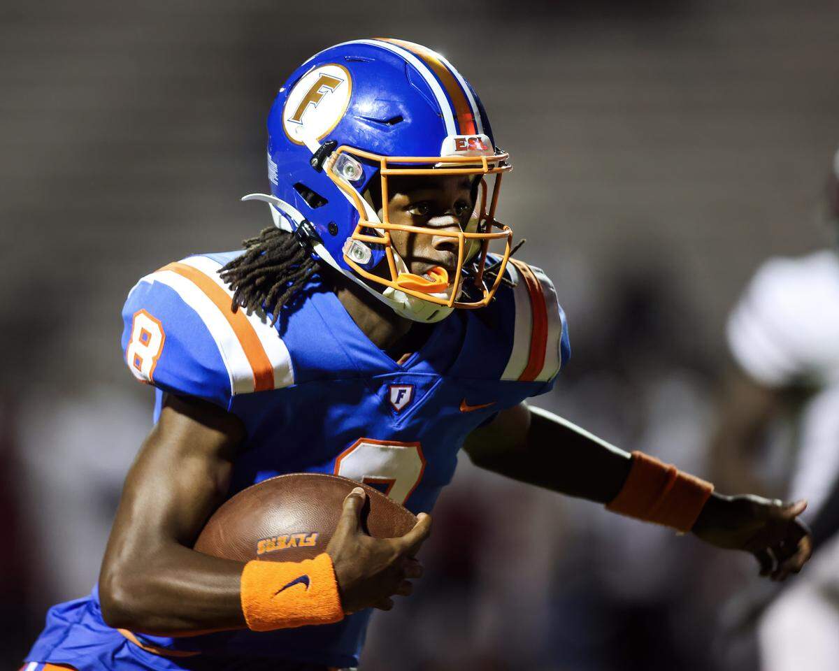 October 4, 2024 - East St. Louis Il, - East St. Louis Kendrick Lyons carries the ball during Friday night’s Southwestern Conference matchup between Belleville West and East St. Louis. [Photo: Chris Johns]