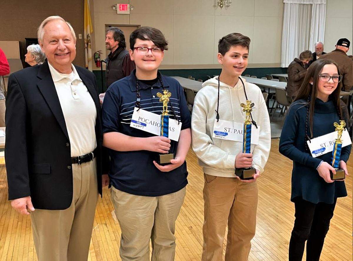 The Knights of Columbus, Highland Council 1580, held its 40th Annual Spelling Bee Championship at their facilities on Illinois 143 in Highland on Saturday, Feb. 6. Pictured are event emcee John Genteman with the winners, from left, Daniel Wick from St. Paul Catholic School, first place; Wyatt Orender from Pocahontas Elementary School, second place; and Ella Henrichs from St. Rose Elementary School, third place.
