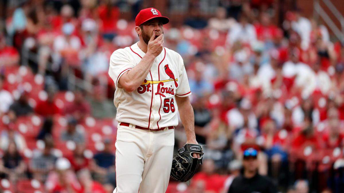 Greg Holland reacts on the mound after giving up a home run.
