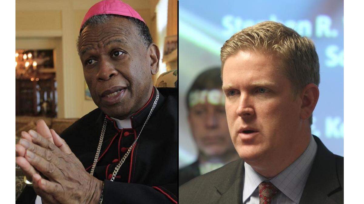 Diocese of Belleville Bishop Edward Braxton (left) and St. Clair County State’s Attorney Brendan Kelly (right)