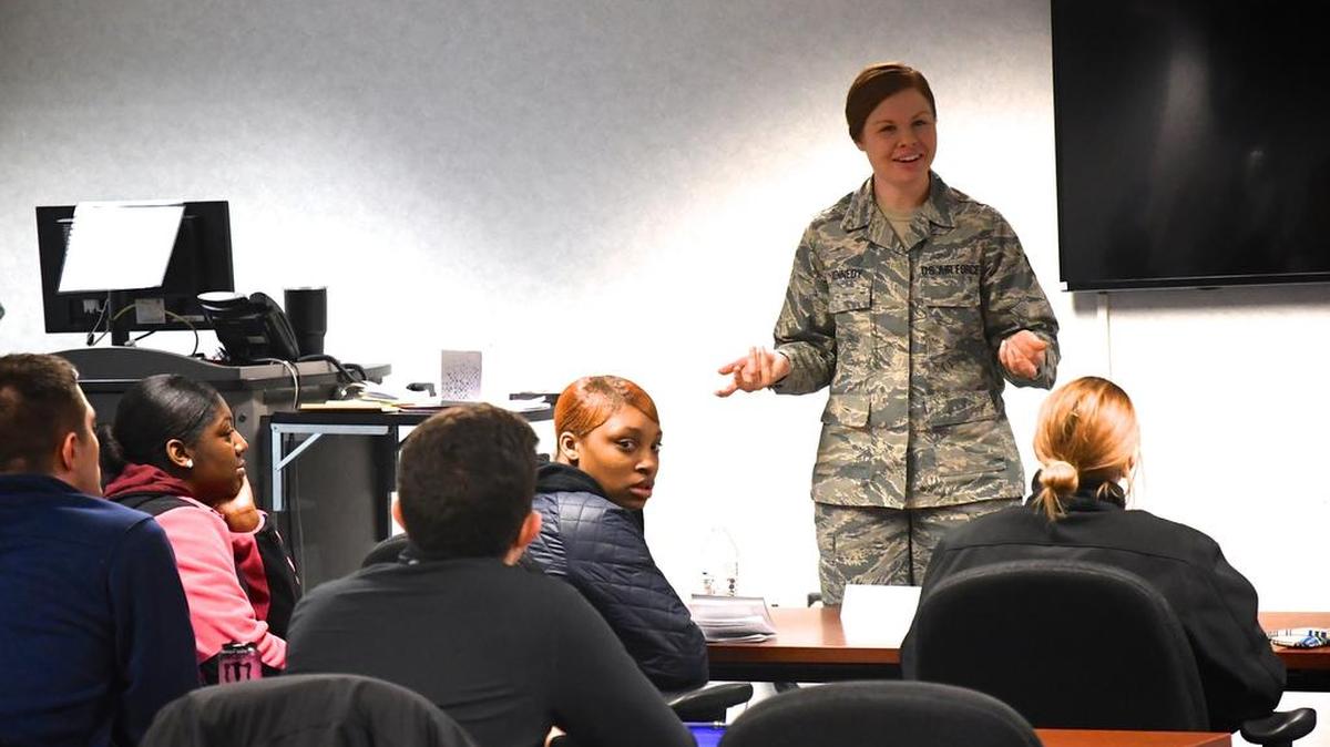Staff Sgt. Kaitlyn Kennedy, 932nd Development and Training Flight coordinator, answers questions of new Airmen during a recent training weekend at Scott Air Force Base.