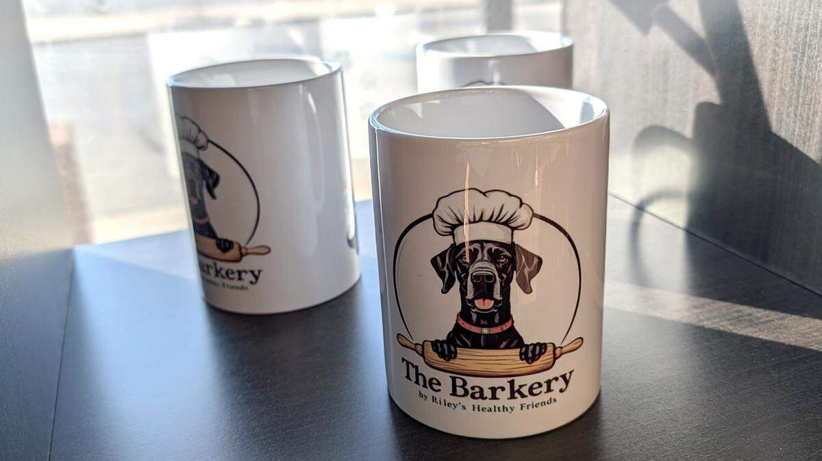 Branded coffee cups at The Barkery feature Riley, Linnemeier's first Great Dane.