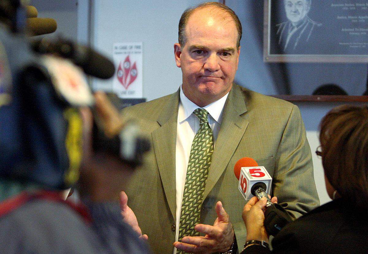 Former State’s attorney Bob Haida speaks with the press.