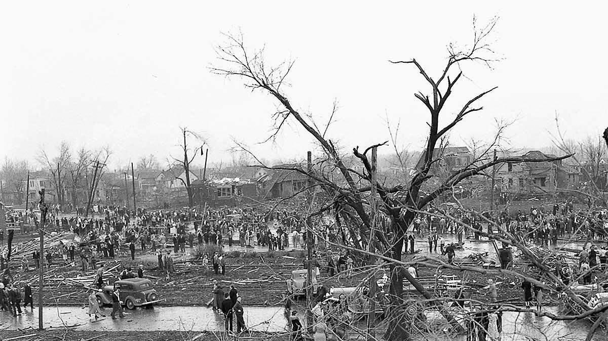 Belleville residents view the damage inflicted by the March 15, 1938, tornado that ripped through town.