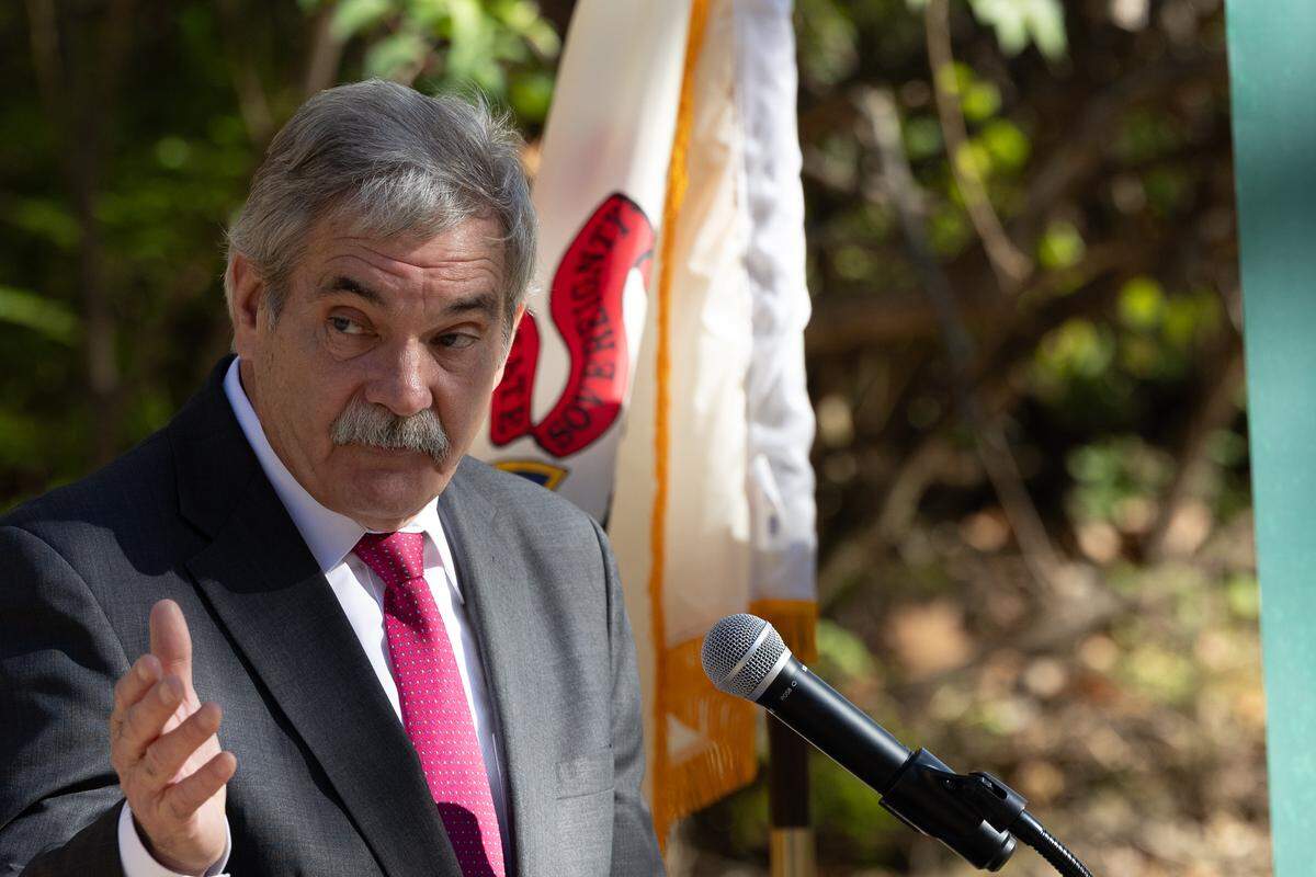 Ken Sharkey, Managing Director of the St. Clair County Transit District, speaks to a crowd of politicians, stakeholders and transit-enthusiasts about the unveiling of the new Liberty Heights trail.