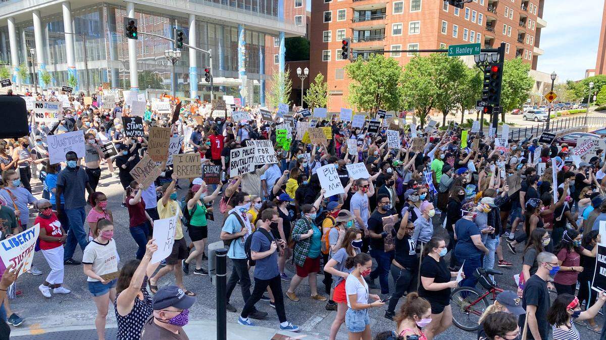 Hundreds of demonstrators marched from Clayton to University City on Saturday in solidarity with protesters in Minneapolis and in other major U.S. cities.