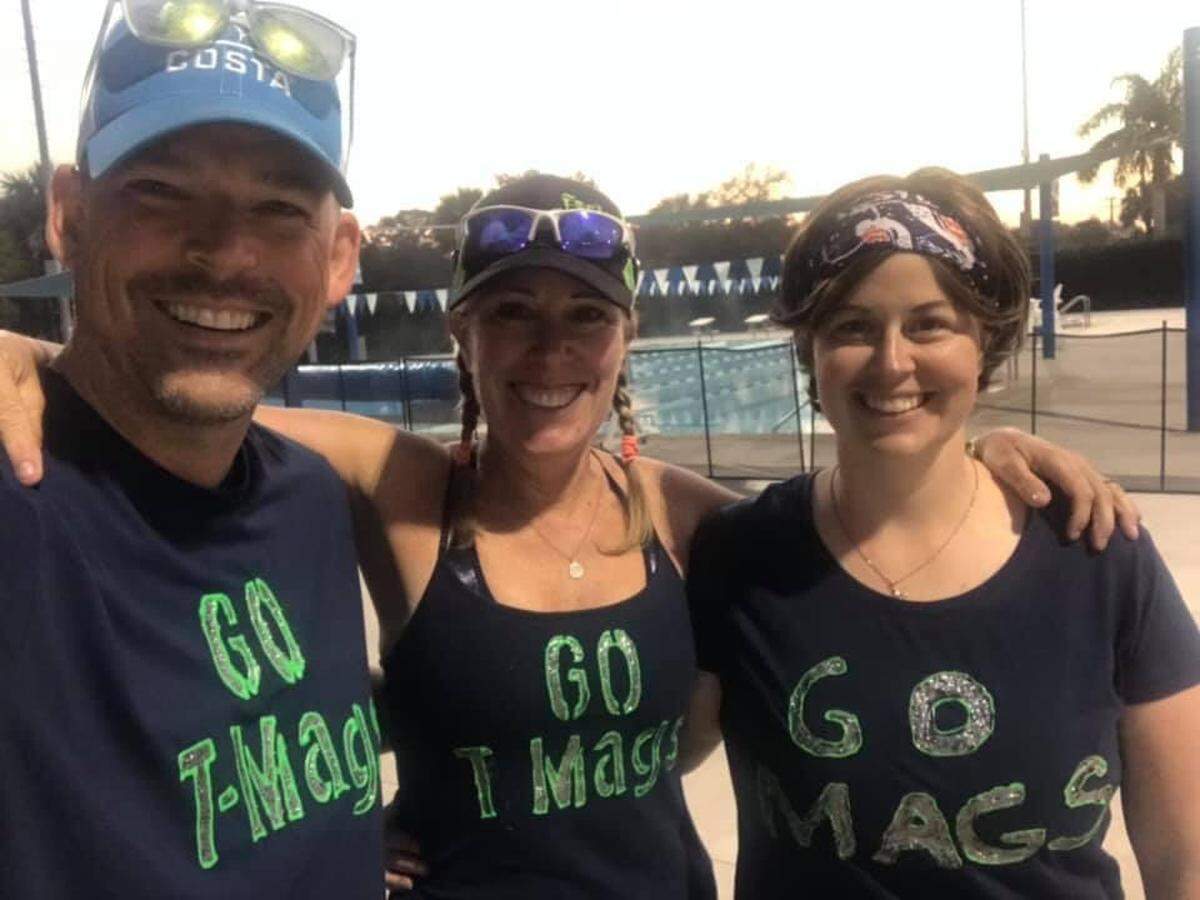 Sarah Delashmit, right, poses with Brian and Liz Hickox during one of her 2019 visits to their Florida vacation home. The couple are among the scam victims interviewed for a new podcast.
