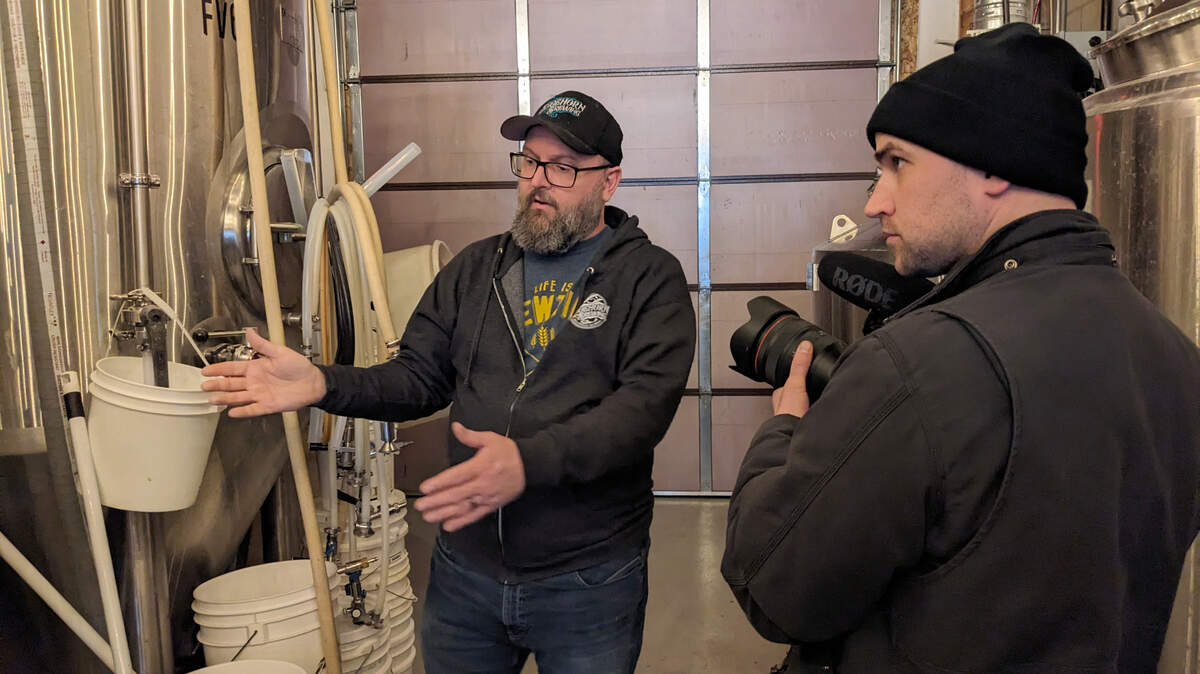 Shoehorn Brewing co-owner Mike Johnson walks through the brewing process with BND visual journalist Joshua Carter.