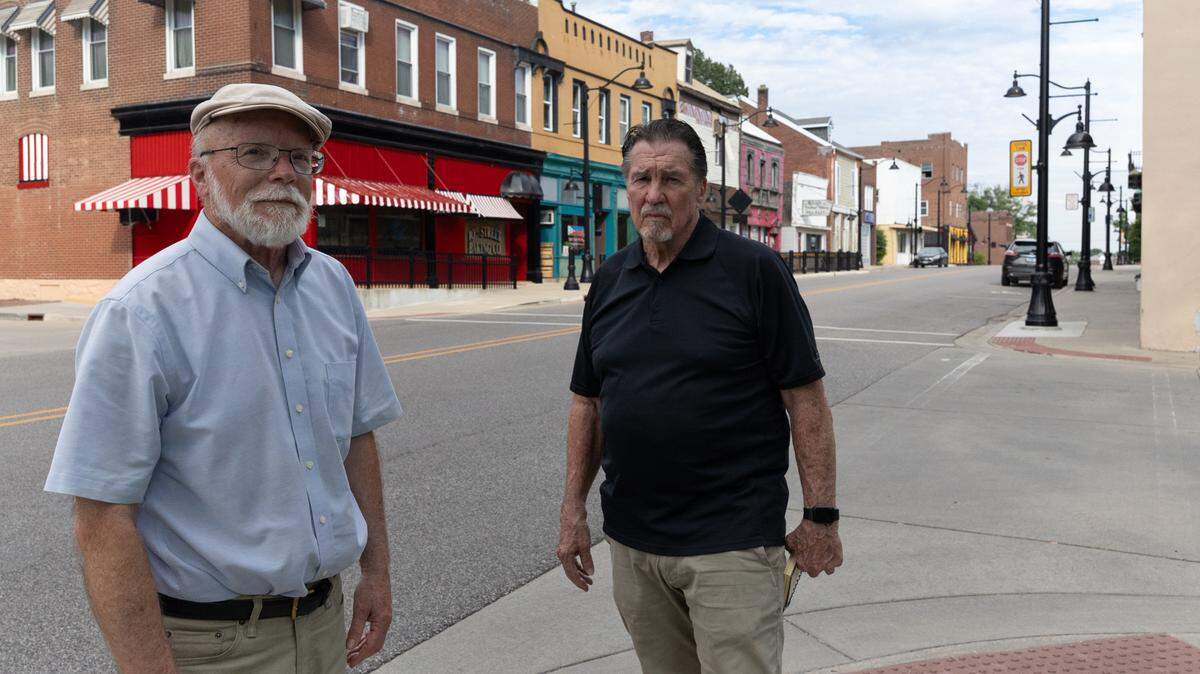 Belleville Historical Society President Larry Betz, right, and Historian Bob Brunkow are unhappy about a plan by St. Clair County and the city of Belleville to demolish a brick storefront on one of the city’s few remaining fully-intact blocks of historical buildings.