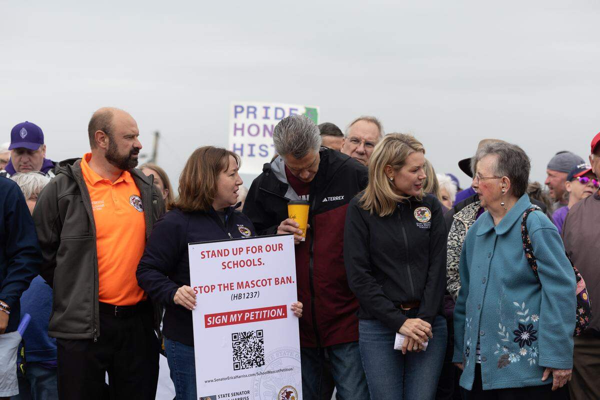 (Starting from left) Illinois State Rep. Kevin Schmidt, Rep. Amy Elik, Rep. David Freiss and State Senator Erica Harriss join a protest against the proposed ban on Native American mascots in Illinois.