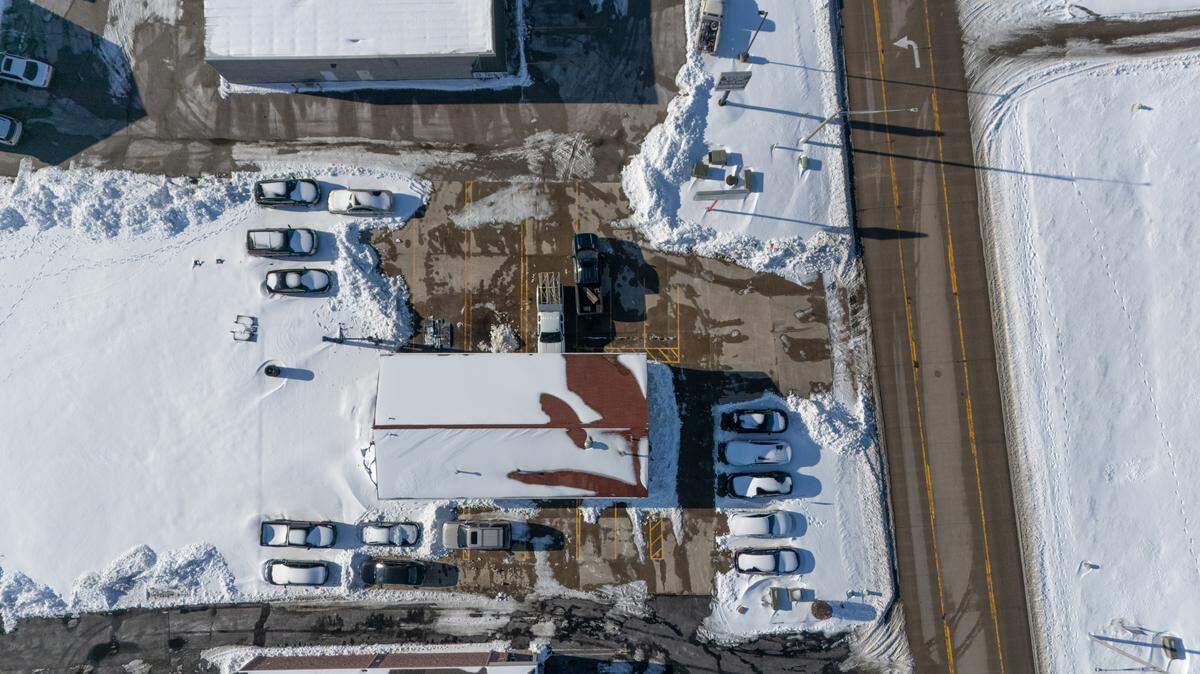 This drone photograph shows the snowy parking lot of a Belleville business along Old Collinsville Road on Wednesday, Jan. 8.