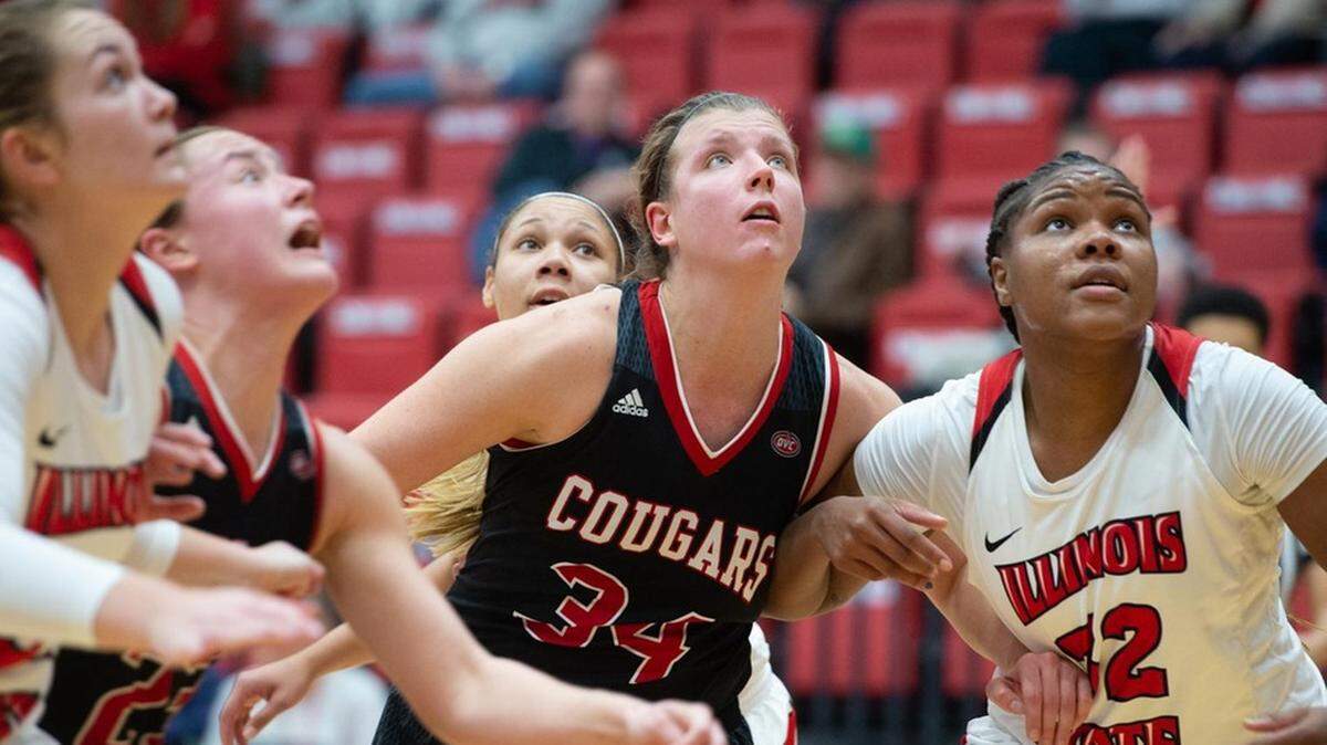 SIUE’s Sydney Bauman looks to grab a rebound in game against Illinois State.
