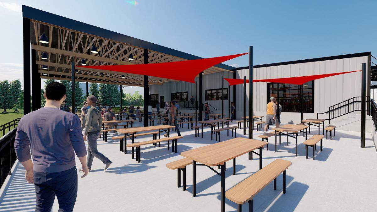 Patio rendering for the Old Base Factory food hall. The development, separate from Park Place, would be included in a special business district that allows developers to impose an additional 1% sales tax.