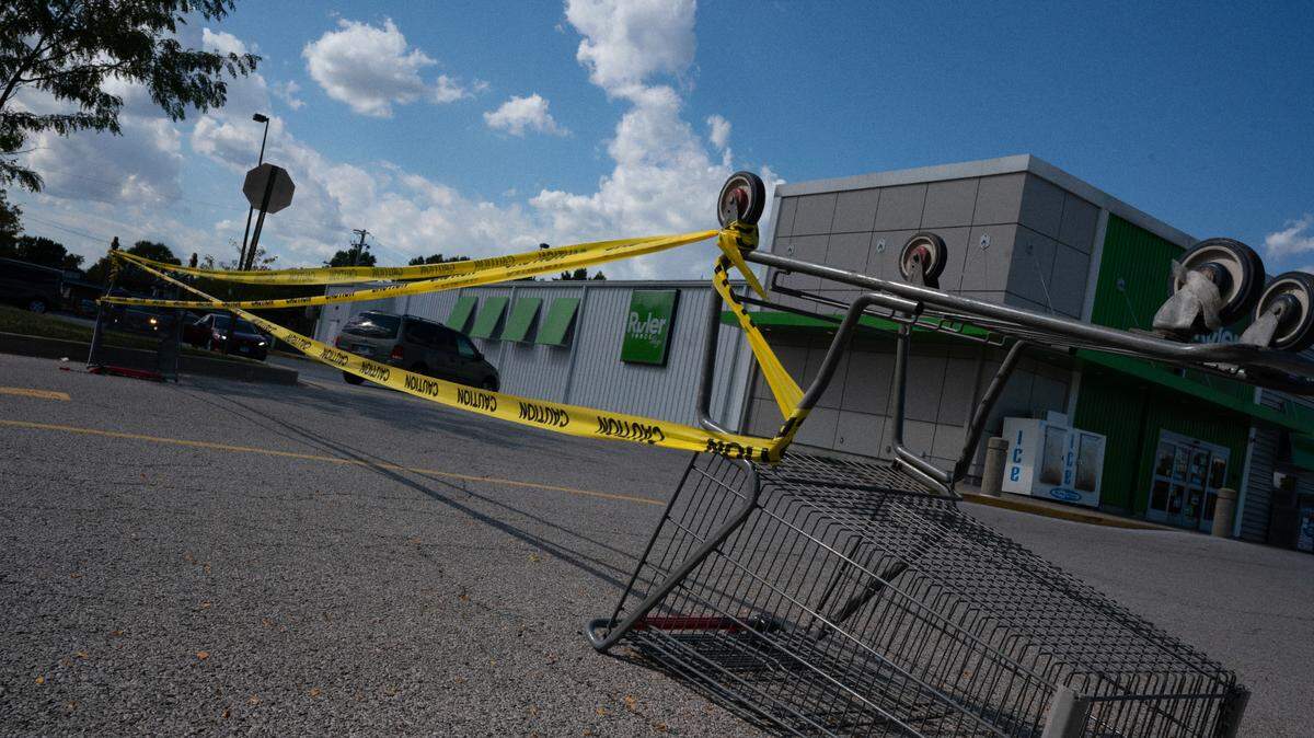 Land subsidence outside of Ruler Foods in Belleville, Ill., where an old mine below the store caused the land surrounding the building to sink into the ground on Sept. 26, 2023.