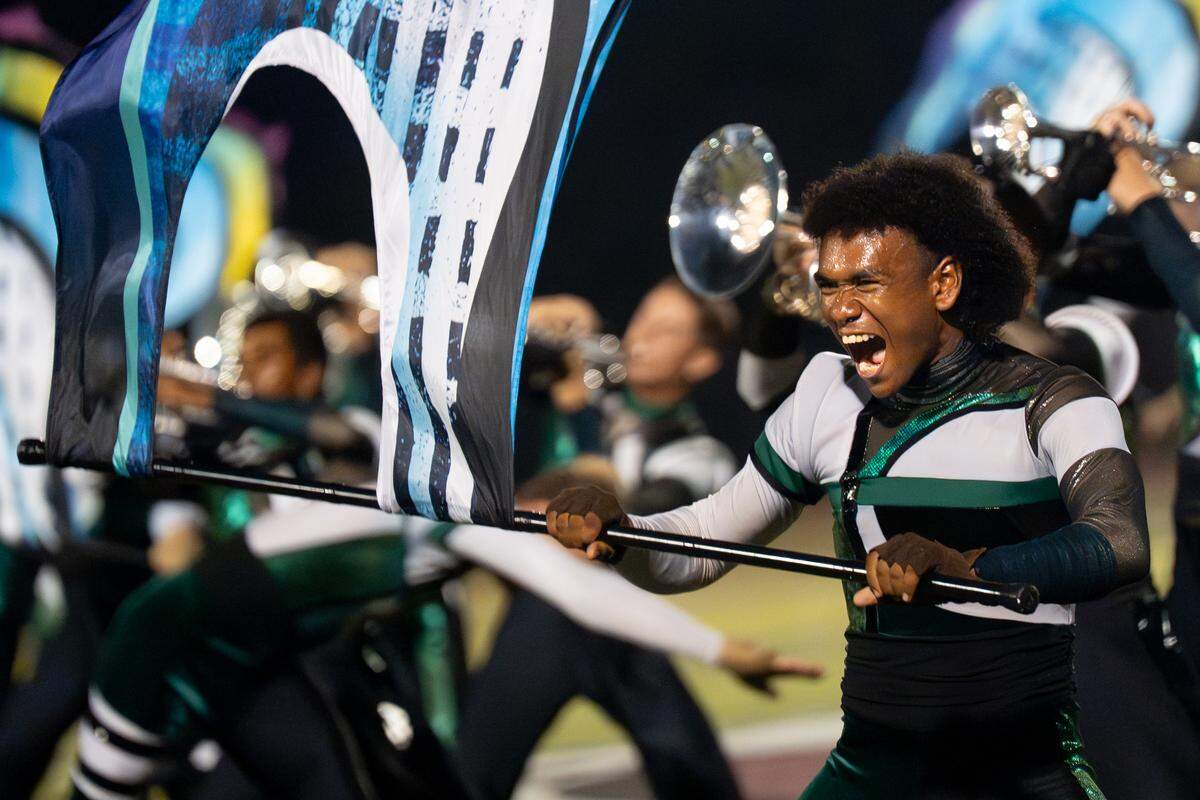The Cavaliers Drum and Bugle Corps, of Rosemont, Illinois, perform their show “ShapeShift” at Belleville West High School on Tuesday, July 22, 2025, in Belleville.