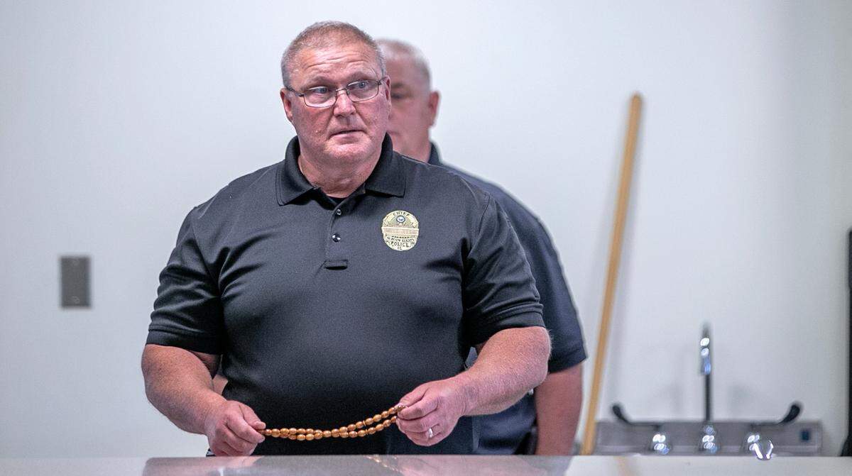 Fairview Heights Chief of Police Chris Locke listens to the public comments during the meeting.