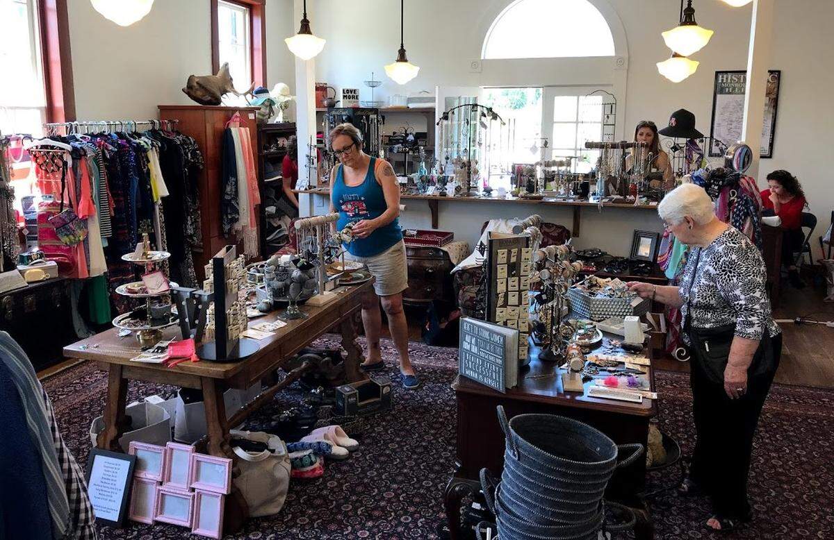 Shoppers check out items for sale at the old Shoemaker School, which has been converted into a “pop-up shop” that can be rented by artists, entrepreneurs and other retailers.