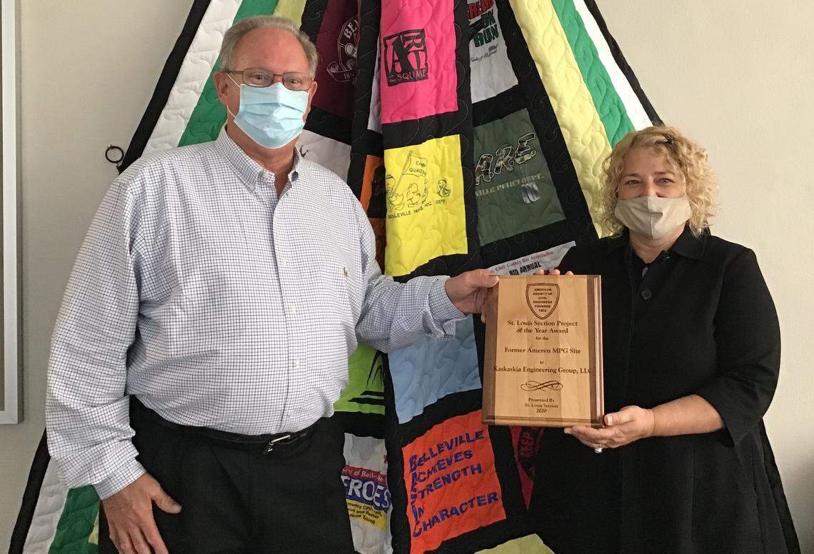 Geri Boyer, president of Kaskaskia Engineering Group in Belleville, is shown with former Mayor Mark Eckert after receiving the 2020 American Society of Civil Engineers St. Louis Section Project of the Year Award for an Ameren site rehabilitation.