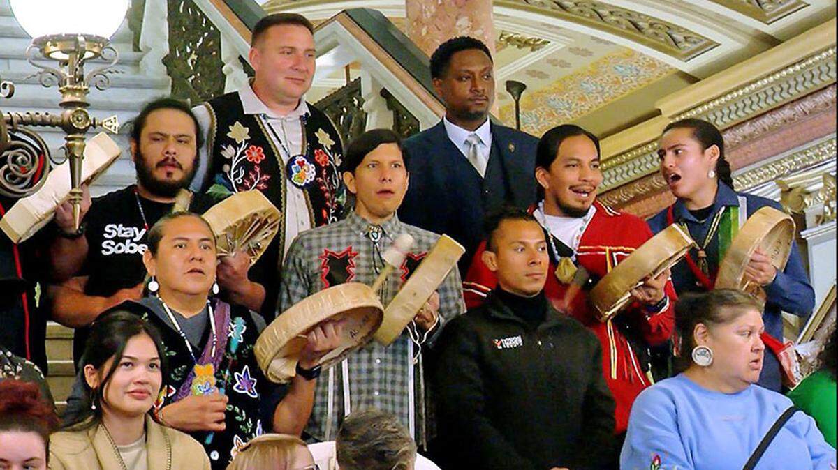 Attendees of the 2025 Native American Summit at the Illinois State Capitol pose for a photo on the Capitol rotunda alongside state Rep. Maurice West, D-Rockford, top right. West convenes a working group on Native American issues at the Capitol.