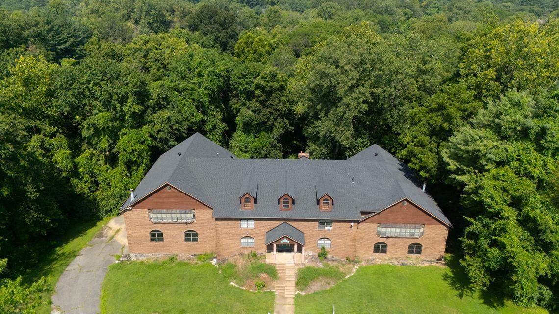 This Belleville fixer-upper has 28 rooms and a swimming pool in the basement