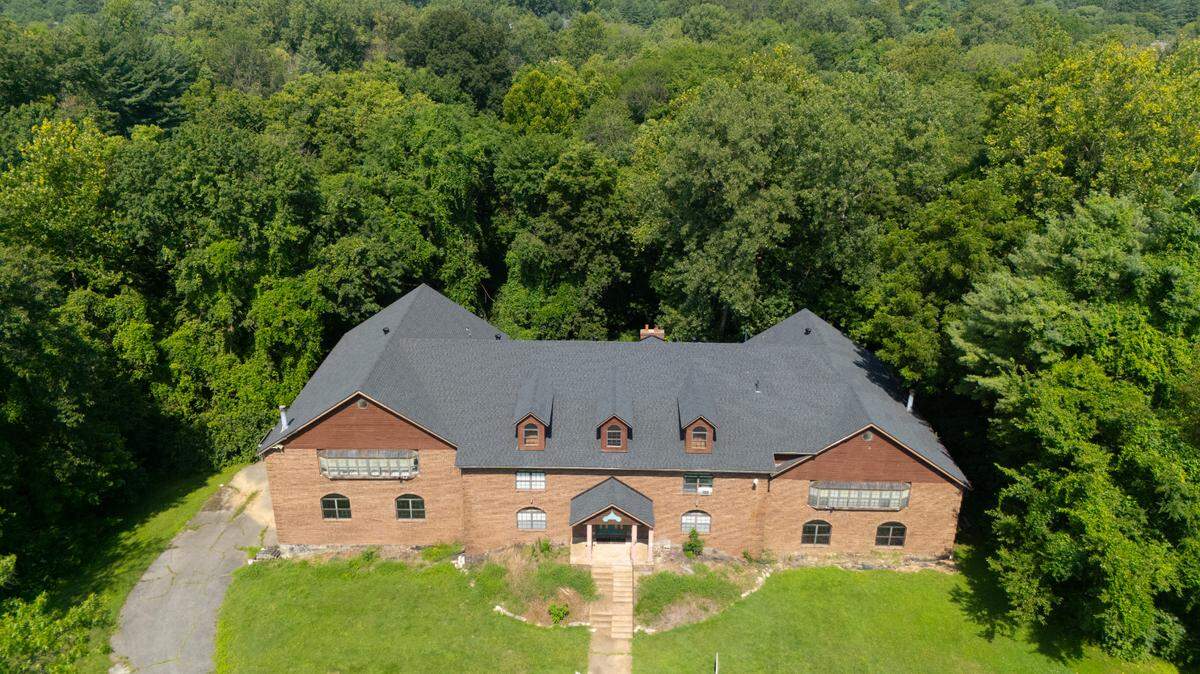 The home at 19 Lake Christine Ct. is in an isolated part of Belleville, at the end of a private cul-de-sac, and surrounded by charming woods.