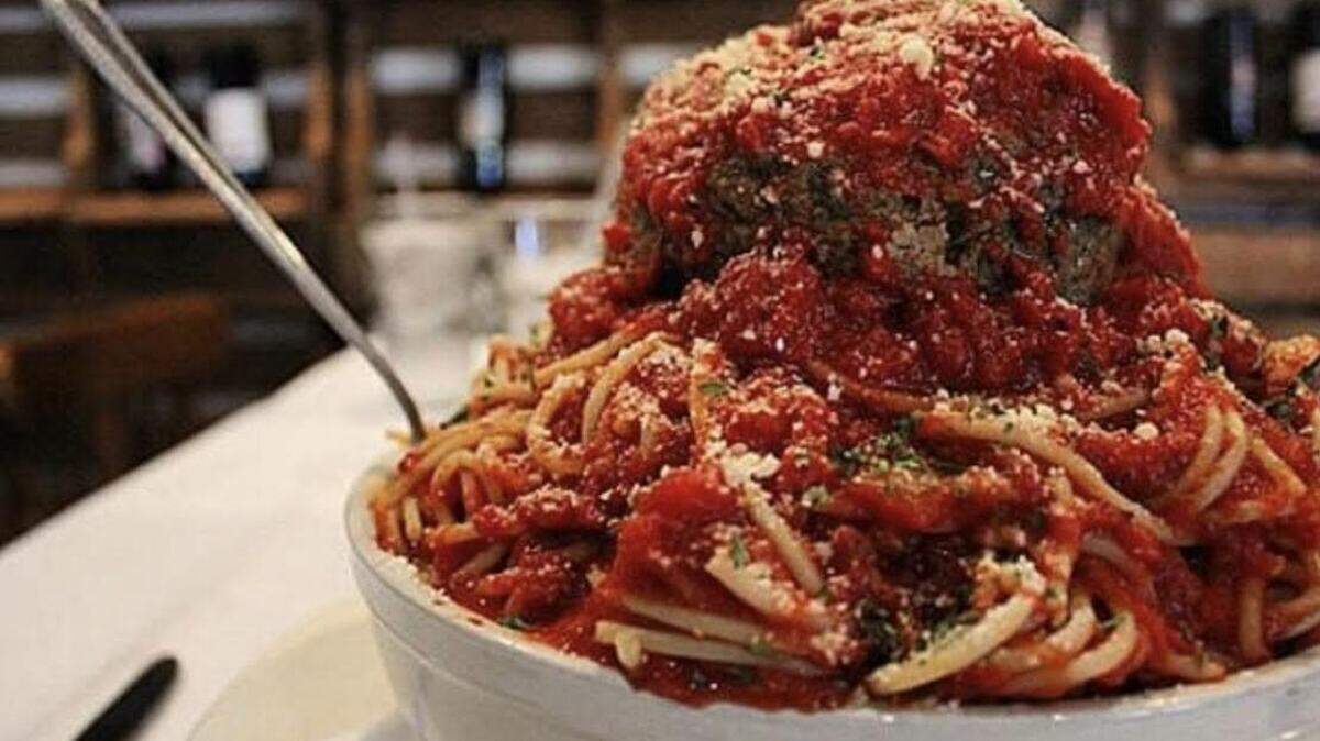 The pasta challenge at Mama’s On The Hill in St. Louis involves 2 pounds of spaghetti, 1 pound of marinara sauce and a 3-pound meatball.